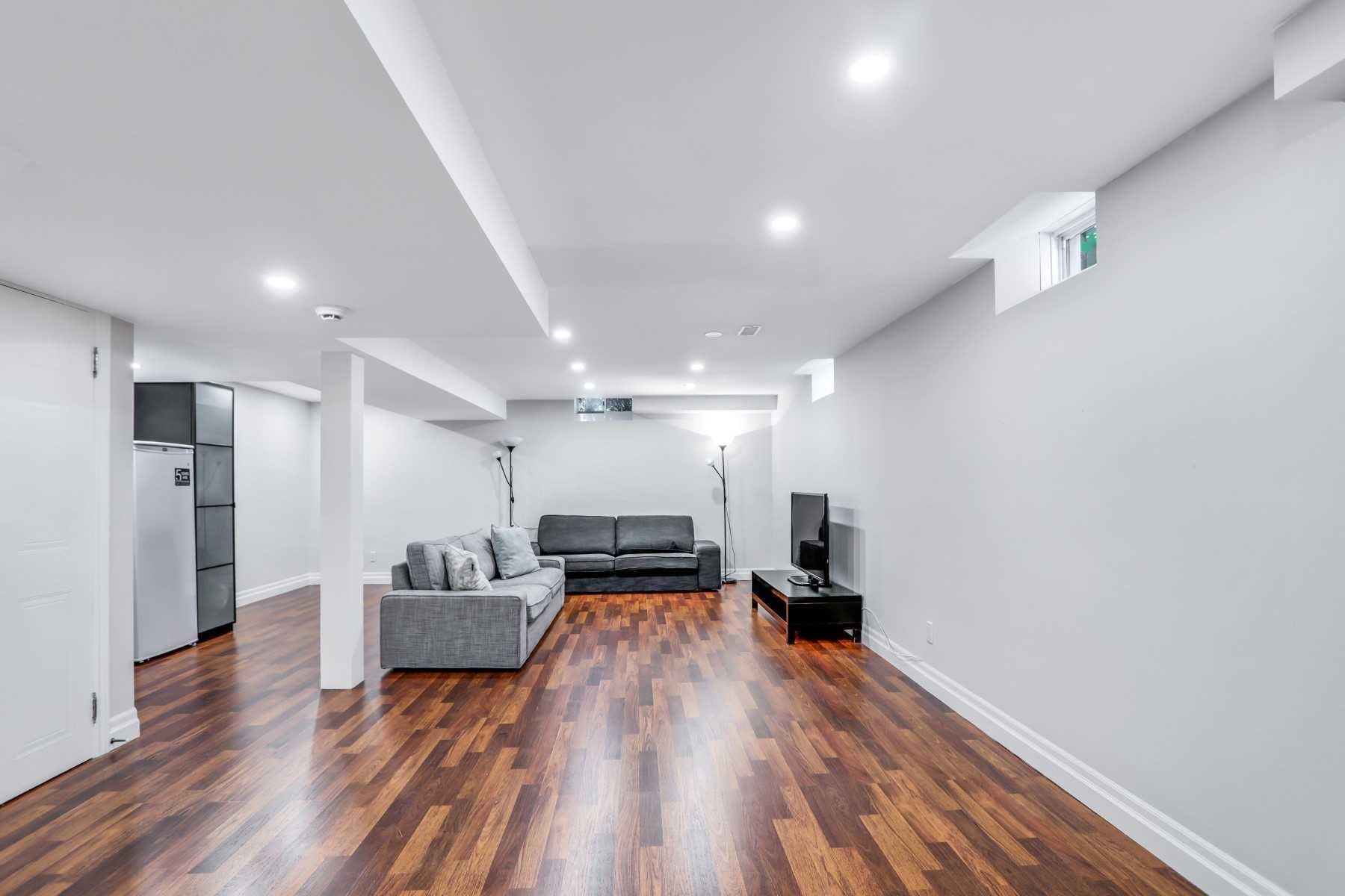 Long finished lower level with living and recreation zones