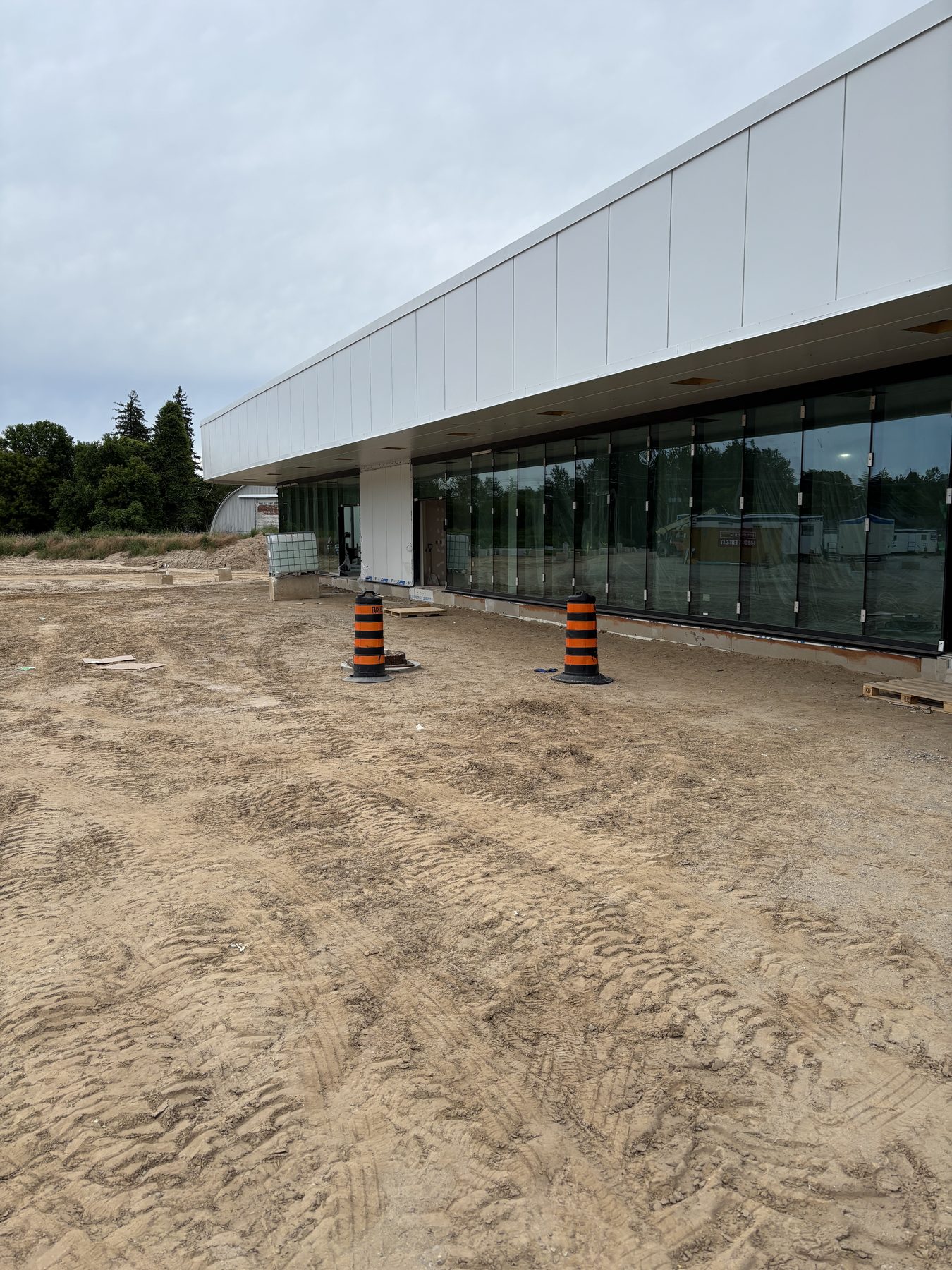 Exterior view along a completed commercial glass wall