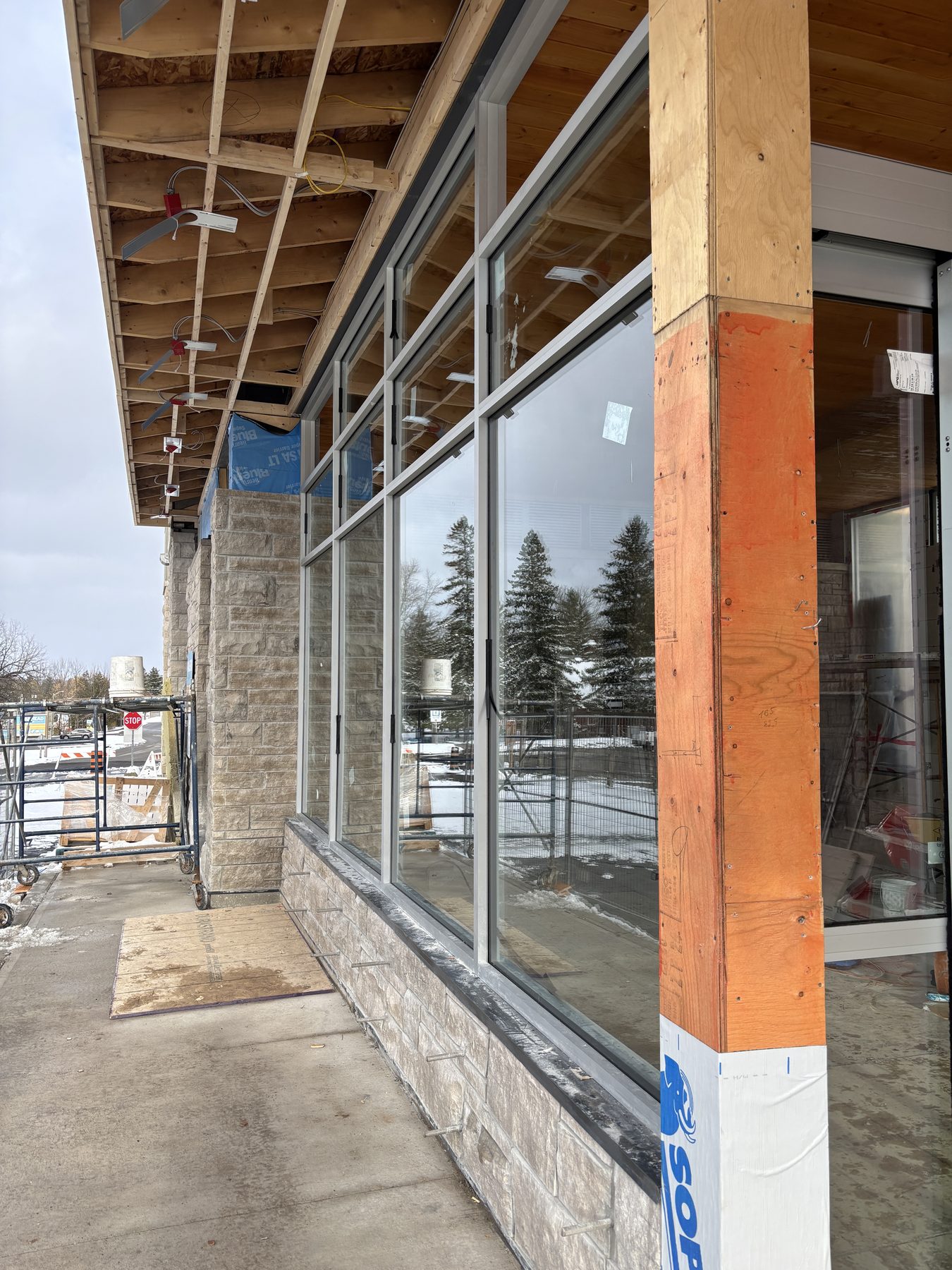 Frames installed along a building exterior during construction