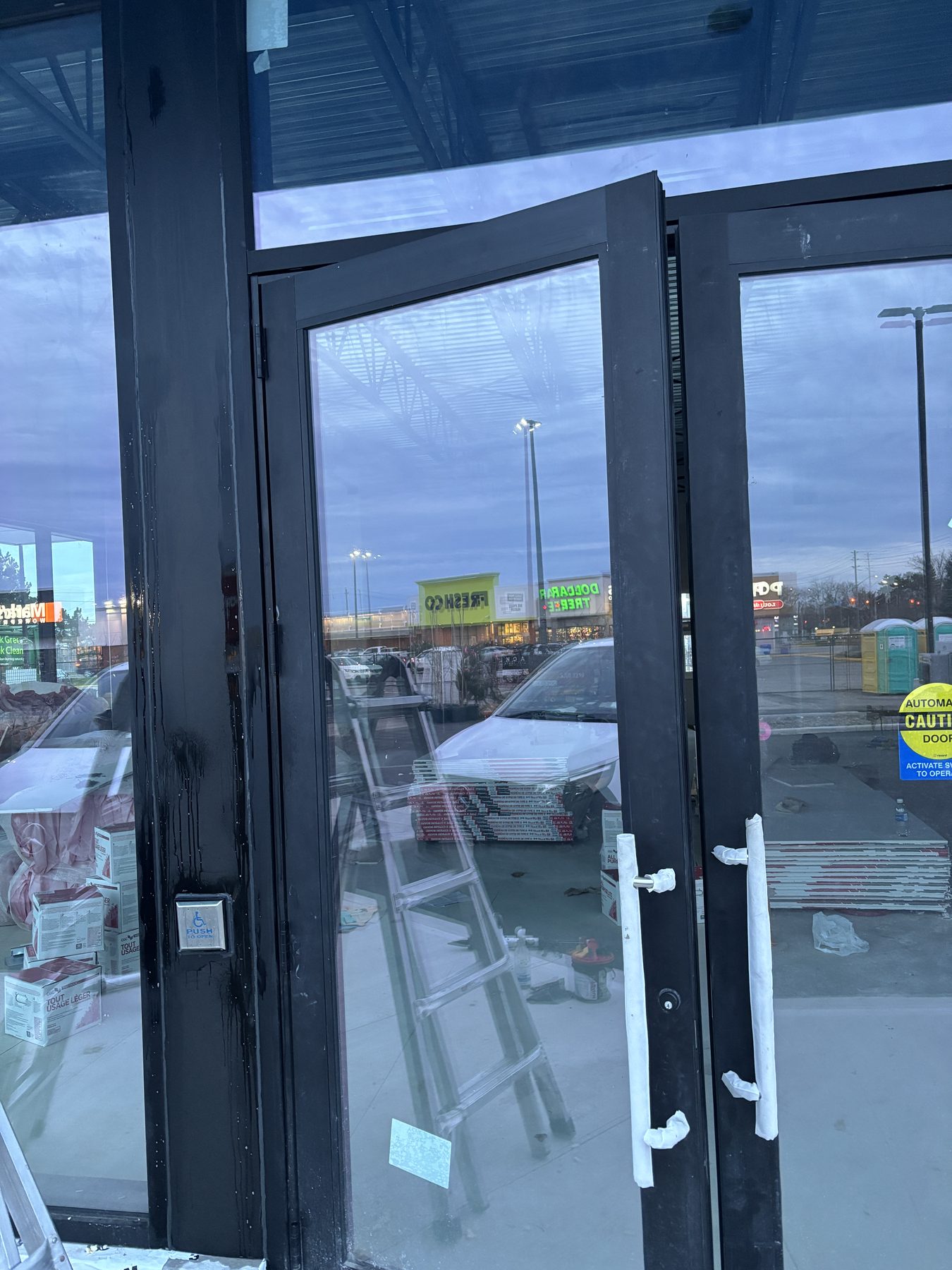 Commercial storefront entrance doors and glazing