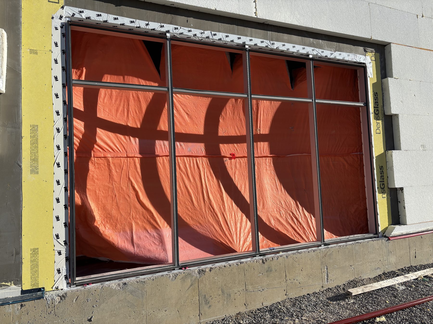 Storefront framing prepared for glass installation